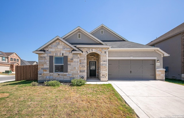 14755 Grey Egret Run, San Antonio, TX 78253 - view of front of house featuring stone siding, an attached garage, stucco siding, and driveway