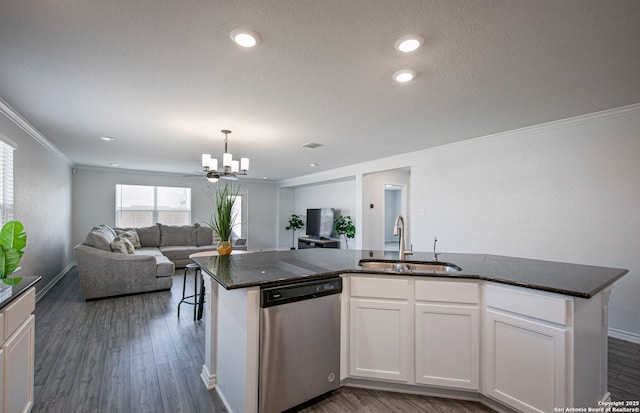 14755 Grey Egret Run, San Antonio, TX 78253 - kitchen featuring dishwasher, a sink, open floor plan, crown molding, and dark wood-style flooring