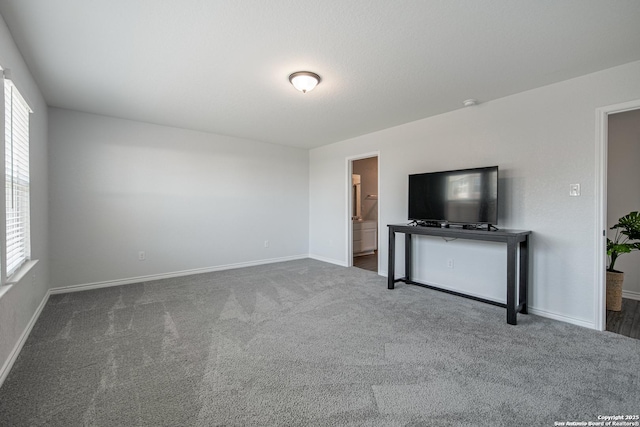 14755 Grey Egret Run, San Antonio, TX 78253 - unfurnished living room with plenty of natural light, baseboards, and carpet flooring