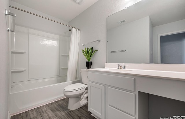 14755 Grey Egret Run, San Antonio, TX 78253 - bathroom featuring toilet, shower / bath combination with curtain, vanity, and wood finished floors