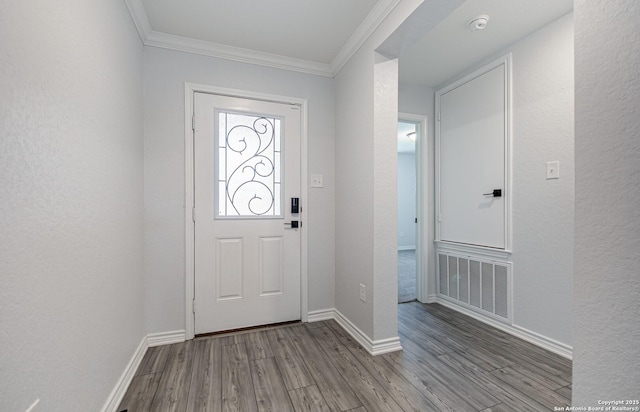 14755 Grey Egret Run, San Antonio, TX 78253 - foyer entrance featuring wood finished floors, ornamental molding, and baseboards
