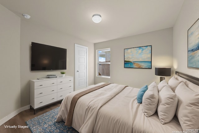 22111 Jordans Pl, San Antonio, TX 78264 - bedroom with dark wood-style flooring and baseboards