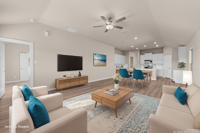 22111 Jordans Pl, San Antonio, TX 78264 - living area with vaulted ceiling, light wood-style floors, ceiling fan, baseboards, and recessed lighting