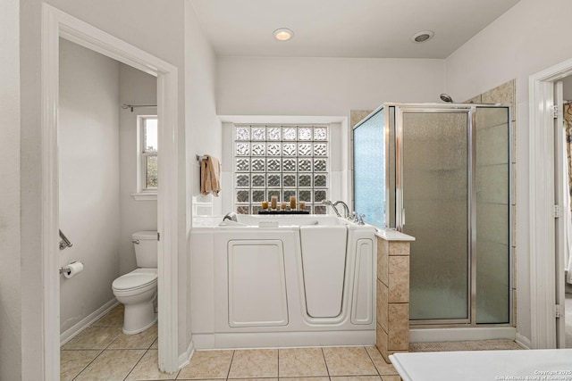 22207 Impala Peak, San Antonio, TX 78259 - full bath with a stall shower, a garden tub, toilet, and tile patterned flooring