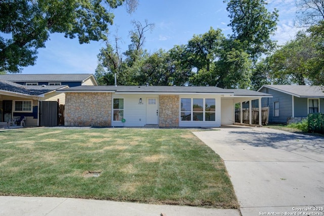 1514 Arroya Vis, San Antonio, TX 78213 - mid-century inspired home with stone siding, concrete driveway, and an attached carport