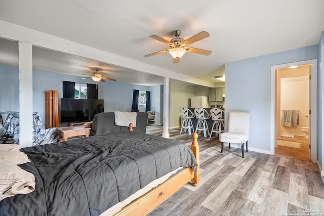 1215 Amanda, Canyon Lake, TX 78133 - bedroom featuring wood finished floors, a ceiling fan, and baseboards