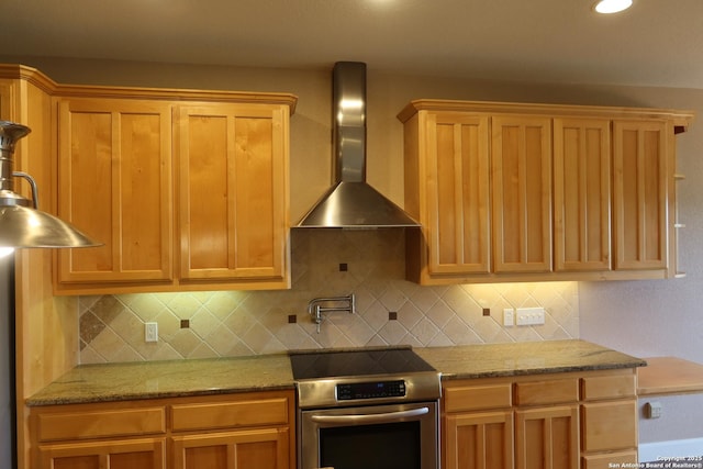 178 Spring Creek Cir, Bandera, TX 78003 - kitchen featuring wall chimney exhaust hood, electric stove, decorative backsplash, and light stone countertops