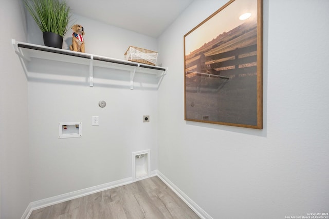 11212 Schmidt Ln, Converse, TX 78109 - washroom with electric dryer hookup, wood finished floors, hookup for a washing machine, baseboards, and gas dryer hookup