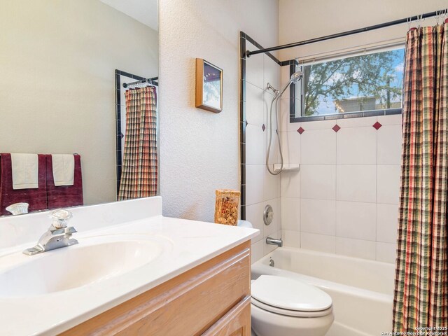 6 Oakwell Farms, San Antonio, TX 78218 - bathroom with shower / tub combo with curtain, vanity, toilet, and a textured wall
