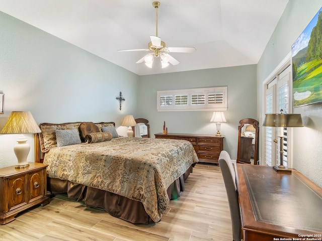 6 Oakwell Farms, San Antonio, TX 78218 - bedroom featuring light wood-type flooring, vaulted ceiling, multiple windows, and ceiling fan
