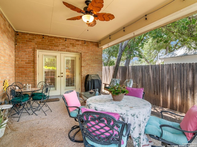 6 Oakwell Farms, San Antonio, TX 78218 - view of patio / terrace with french doors, outdoor dining area, a ceiling fan, and area for grilling