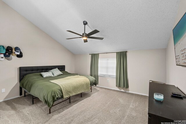 7306 Park W, San Antonio, TX 78250 - carpeted bedroom with baseboards, lofted ceiling, a textured ceiling, and a ceiling fan