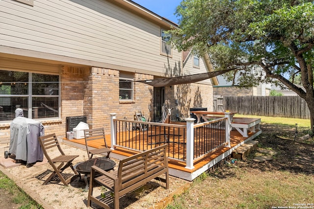 7306 Park W, San Antonio, TX 78250 - wooden deck with a fire pit and grilling area