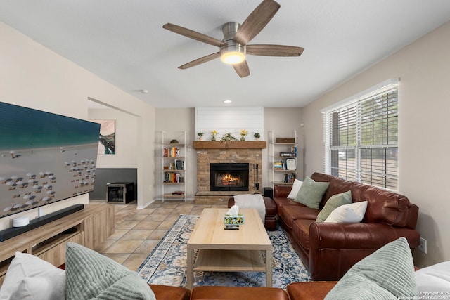 7306 Park W, San Antonio, TX 78250 - living room featuring a fireplace, light tile patterned floors, a ceiling fan, and built in features