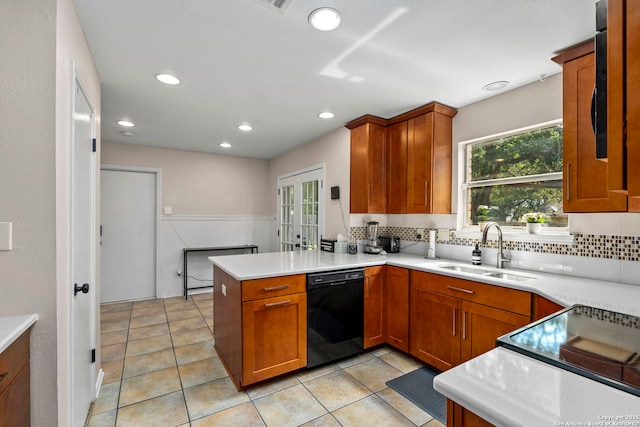 7306 Park W, San Antonio, TX 78250 - kitchen with black appliances, a sink, a peninsula, healthy amount of natural light, and recessed lighting
