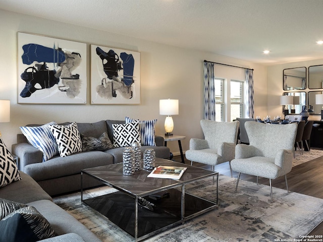 9921 Paladin Rdg, San Antonio, TX 78254 - living area featuring wood finished floors and recessed lighting