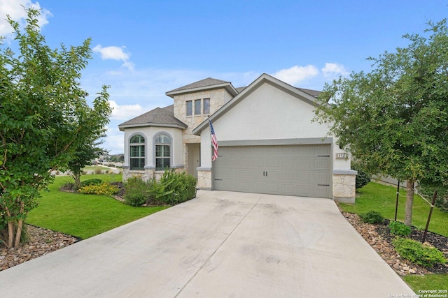 112 La Cima, Boerne, TX 78006 - view of front of property featuring stone siding, an attached garage, a front lawn, and driveway