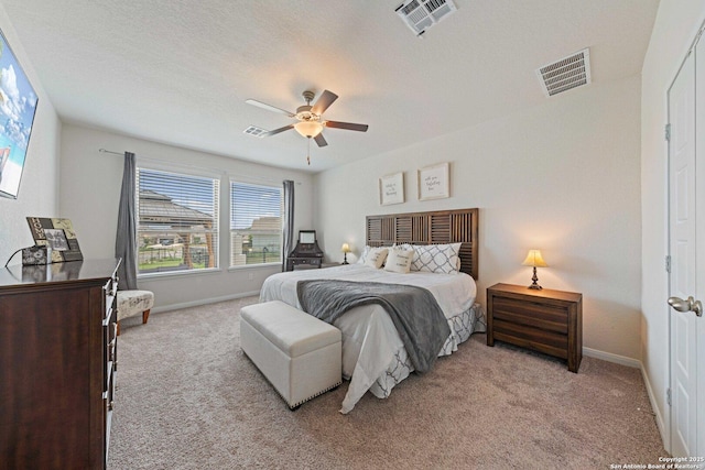 112 La Cima, Boerne, TX 78006 - bedroom featuring light colored carpet, baseboards, and ceiling fan