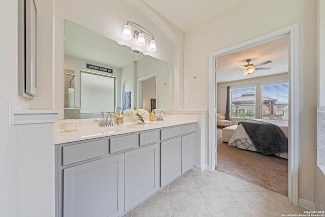 112 La Cima, Boerne, TX 78006 - full bath with double vanity, a ceiling fan, ensuite bath, and tile patterned floors