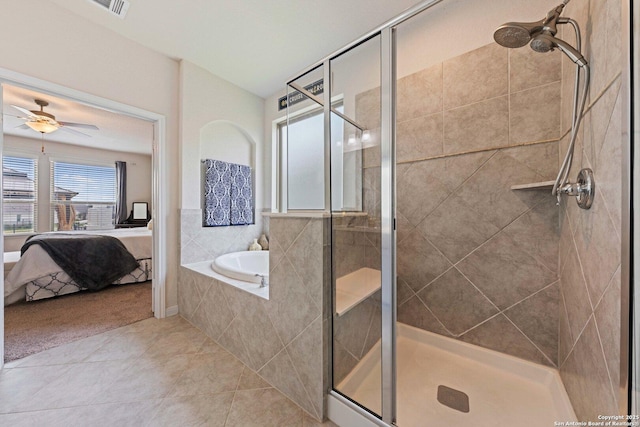 112 La Cima, Boerne, TX 78006 - full bath with connected bathroom, tile patterned floors, a garden tub, a stall shower, and a ceiling fan