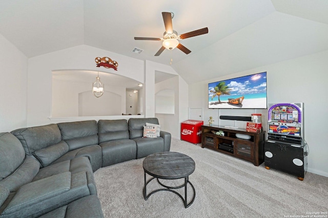 112 La Cima, Boerne, TX 78006 - carpeted living room featuring vaulted ceiling, a ceiling fan, a chandelier, and arched walkways