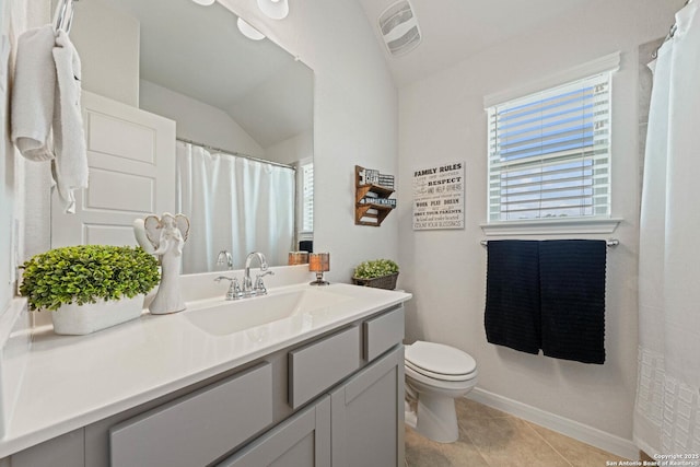 112 La Cima, Boerne, TX 78006 - bathroom featuring toilet, vanity, vaulted ceiling, tile patterned flooring, and baseboards