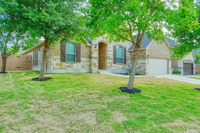12902 Gypsophila, San Antonio, TX 78253 - view of front of property with stone siding, a gate, brick siding, concrete driveway, and an attached garage