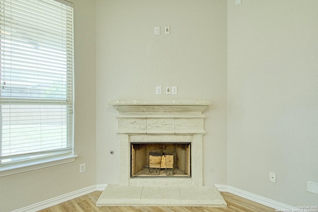 12902 Gypsophila, San Antonio, TX 78253 - detailed view of wood finished floors, baseboards, and a tiled fireplace