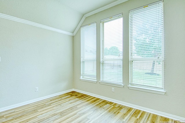 12902 Gypsophila, San Antonio, TX 78253 - unfurnished room featuring lofted ceiling, ornamental molding, baseboards, and wood finished floors