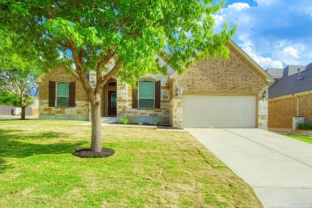 12902 Gypsophila, San Antonio, TX 78253 - obstructed view of property with an attached garage, concrete driveway, brick siding, and a front yard