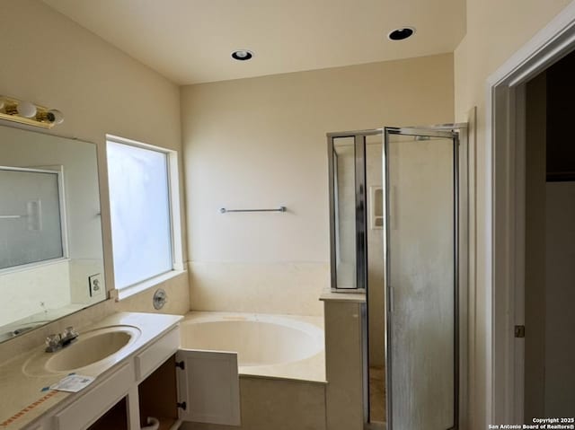 135 Muirfield Ln, Vernia, TX 78121 - full bath featuring vanity, a stall shower, and a garden tub