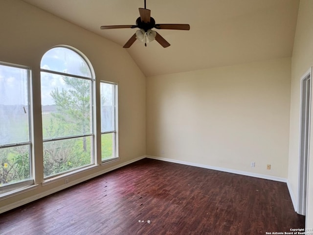 135 Muirfield Ln, Vernia, TX 78121 - unfurnished room featuring dark wood finished floors, vaulted ceiling, a ceiling fan, and baseboards
