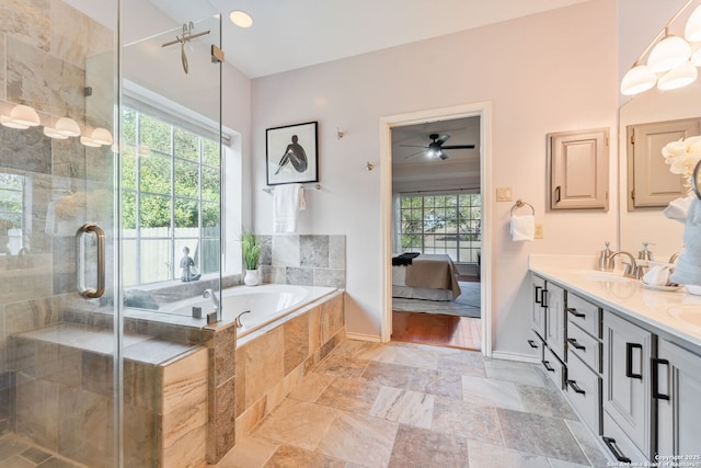 17915 Crystal Knl, San Antonio, TX 78258 - full bathroom featuring double vanity, a bath, a stall shower, and ensuite bath