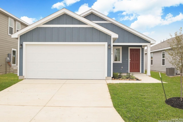 8570 Redhawk Lp, San Antonio, TX 78222 - view of front of property with board and batten siding, concrete driveway, a front yard, and an attached garage