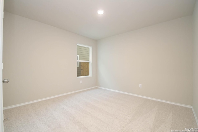 8570 Redhawk Lp, San Antonio, TX 78222 - unfurnished room featuring carpet, baseboards, and recessed lighting