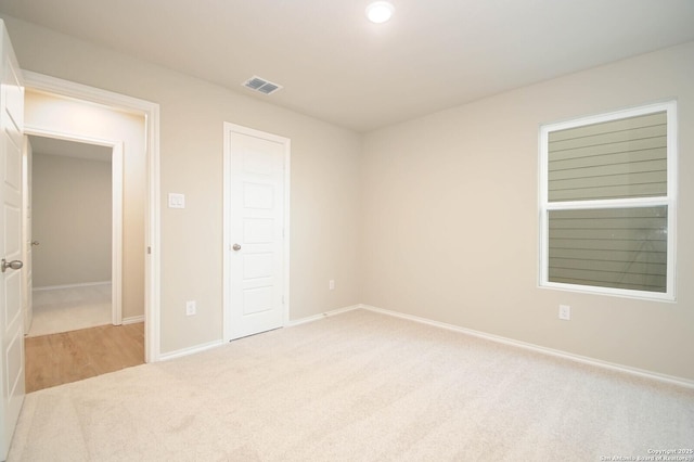 8570 Redhawk Lp, San Antonio, TX 78222 - unfurnished bedroom with carpet flooring and baseboards
