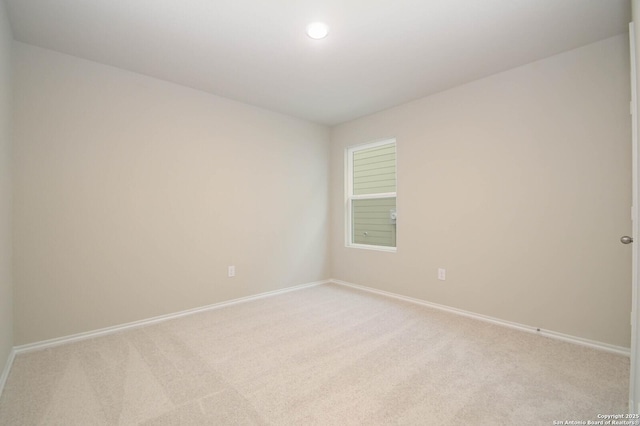 8570 Redhawk Lp, San Antonio, TX 78222 - spare room featuring light carpet, baseboards, and recessed lighting
