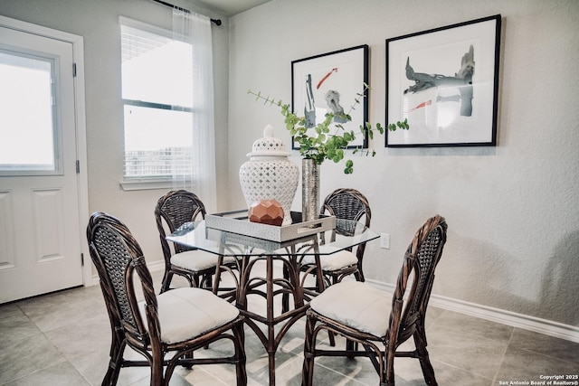 158 Landing Ln, New Braunfels, TX 78130 - dining area featuring baseboards and light tile patterned floors