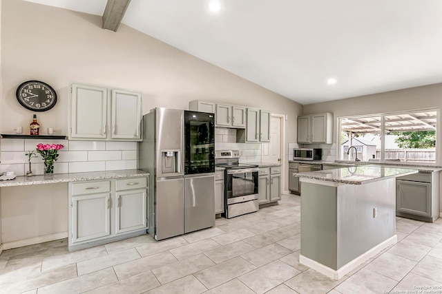 5815 Oak Run, San Antonio, TX 78247 - kitchen featuring stainless steel appliances, gray cabinetry, backsplash, light stone countertops, and recessed lighting