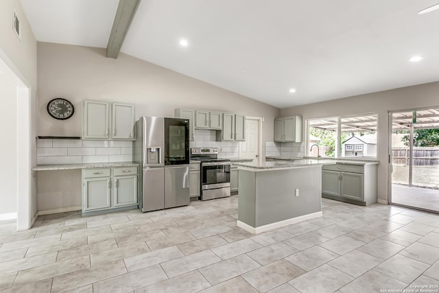 5815 Oak Run, San Antonio, TX 78247 - kitchen with appliances with stainless steel finishes, decorative backsplash, a center island, gray cabinetry, and recessed lighting
