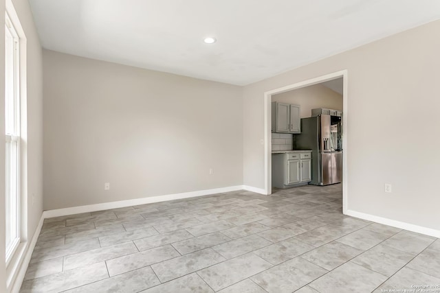 5815 Oak Run, San Antonio, TX 78247 - unfurnished living room featuring recessed lighting and baseboards