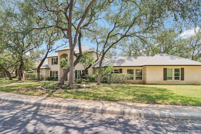 15643 Cloud Top, San Antonio, TX 78248 - traditional-style house with a front yard and brick siding