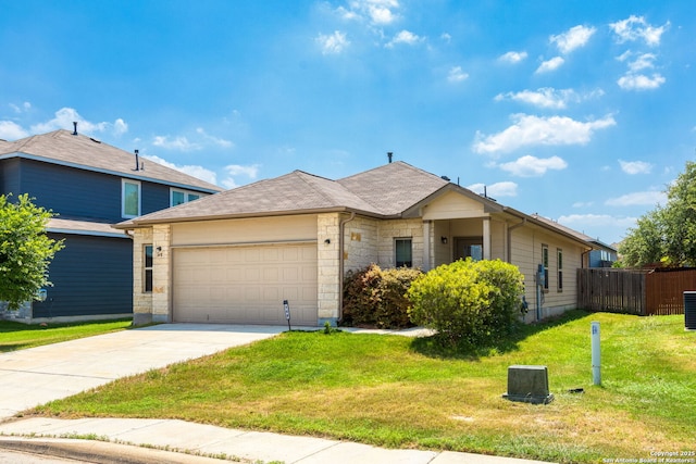 148 Whitetail, San Antonio, TX 78253 - view of front of home featuring a garage, driveway, stone siding, and central air condition unit