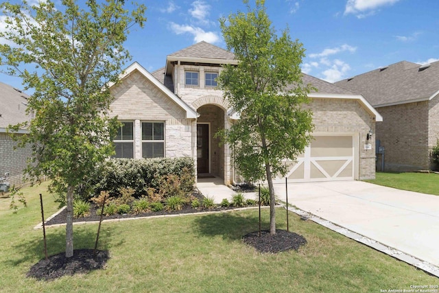 146 Beaver Bnd, Boerne, TX 78006 - view of front of house with stone siding, driveway, a front yard, and a garage