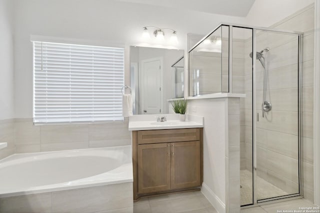 146 Beaver Bnd, Boerne, TX 78006 - full bathroom featuring a shower stall, vanity, a bath, and tile patterned flooring