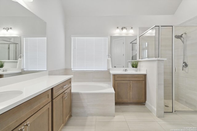 146 Beaver Bnd, Boerne, TX 78006 - full bath featuring a shower stall, tile patterned floors, two vanities, and a bath
