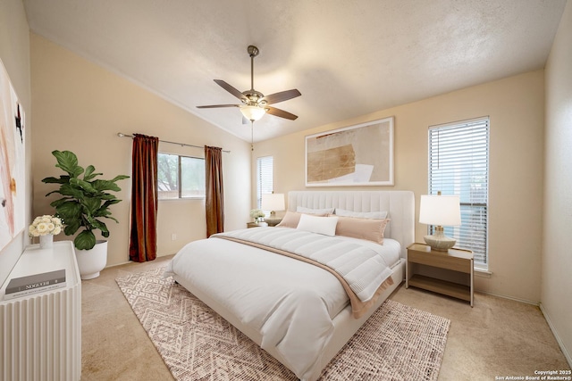 3202 Morning Crk, San Antonio, TX 78247 - bedroom featuring light colored carpet, lofted ceiling, a ceiling fan, and baseboards