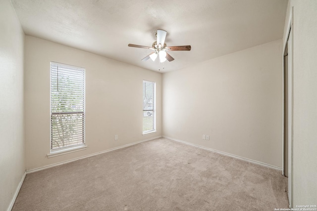 3202 Morning Crk, San Antonio, TX 78247 - carpeted spare room featuring plenty of natural light, ceiling fan, and baseboards
