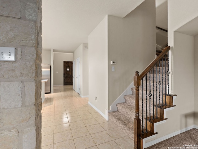 515 Secluded Grv, San Antonio, TX 78253 - stairway featuring baseboards and tile patterned flooring