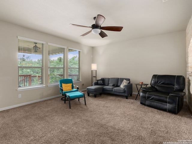 515 Secluded Grv, San Antonio, TX 78253 - carpeted living room with ceiling fan and baseboards